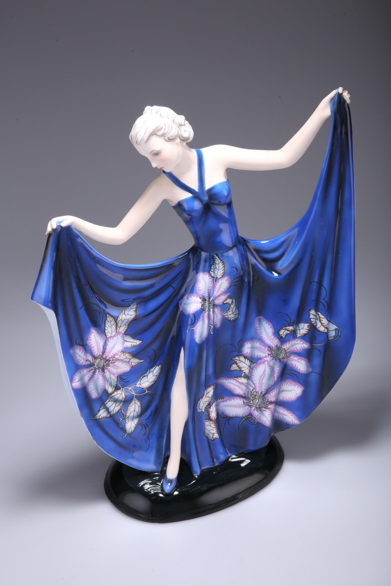 A LARGE ART DECO GOLDSCHEIDER FIGURE OF A DANCING GIRL, CIRCA 1925, by Stefan Dakon, the lady in