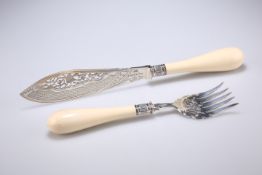 A FINE PAIR OF VICTORIAN SILVER AND IVORY-HANDLED FISH SERVERS, by John Edward Bingham, Sheffield
