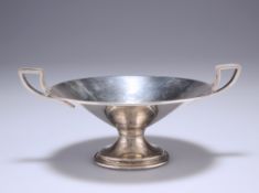 AN ART DECO SILVER TAZZA, maker's mark indistinct, with angular handles and raised above a