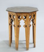AN ARTS AND CRAFTS OAK AND COPPER OCCASIONAL TABLE, with octagonal copper top. 74cm high, 58cm