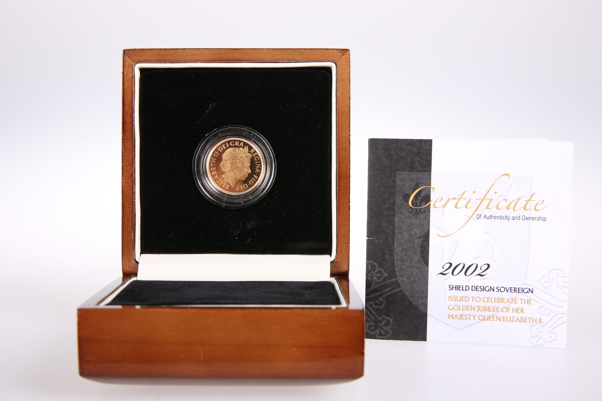 2002 22 CARAT GOLD SHIELD BACK FULL SOVEREIGN, by London Mint in plastic capsule, with certificate