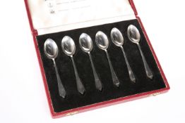 A CASED SET OF SIX SILVER COFFEE SPOONS, by Travis, Wilson & Co Ltd, each bearing specimen hallmarks