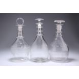 THREE GEORGIAN GLASS DECANTERS, the first with graduated triple ring neck and etched with fruiting