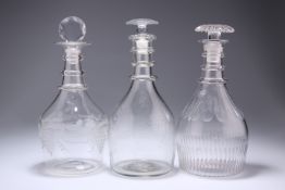 THREE GEORGIAN GLASS DECANTERS, the first with graduated triple ring neck and etched with fruiting