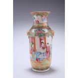 A LATE 19TH CENTURY CANTONESE FAMILLE ROSE VASE, baluster form with gilt moulded mask handles,