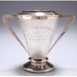 ^ AN ELIZABETH II SILVER TWO-HANDLED TROPHY, maker's mark indistinct, Birmingham 1957, engraved "