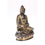 A CHINESE BRONZE FIGURE OF BUDDHA SHAKYAMUNI, 19TH CENTURY, modelled seated, partially gilded. 19.