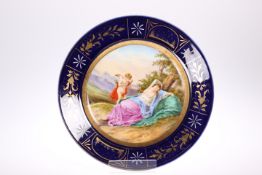 A VIENNA STYLE CABINET PLATE, CIRCA 1900, decorated with cupid and sleeping maiden, titled verso '