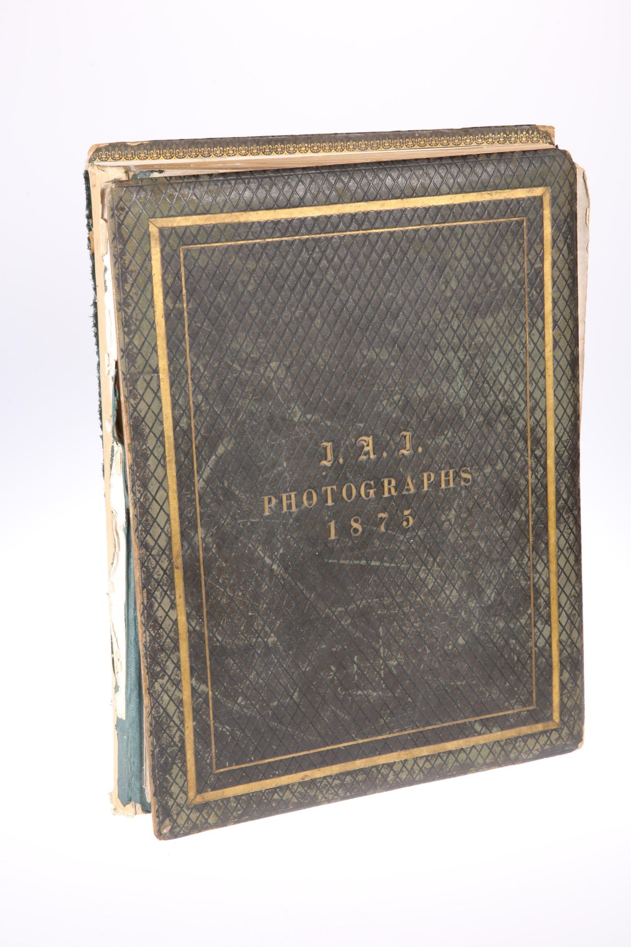 A 19TH CENTURY PHOTOGRAPH ALBUM, containing black and white photographs of antiquities, stamped to