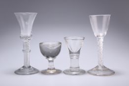 A GROUP OF FOUR ANTIQUE DRINKING GLASSES, comprising two airtwist wines and two penny licks. (4)