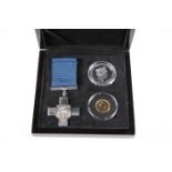 A GEORGE CROSS GOLD AND SILVER PROOF SET, comprising a sterling silver crown, a 9 carat white gold