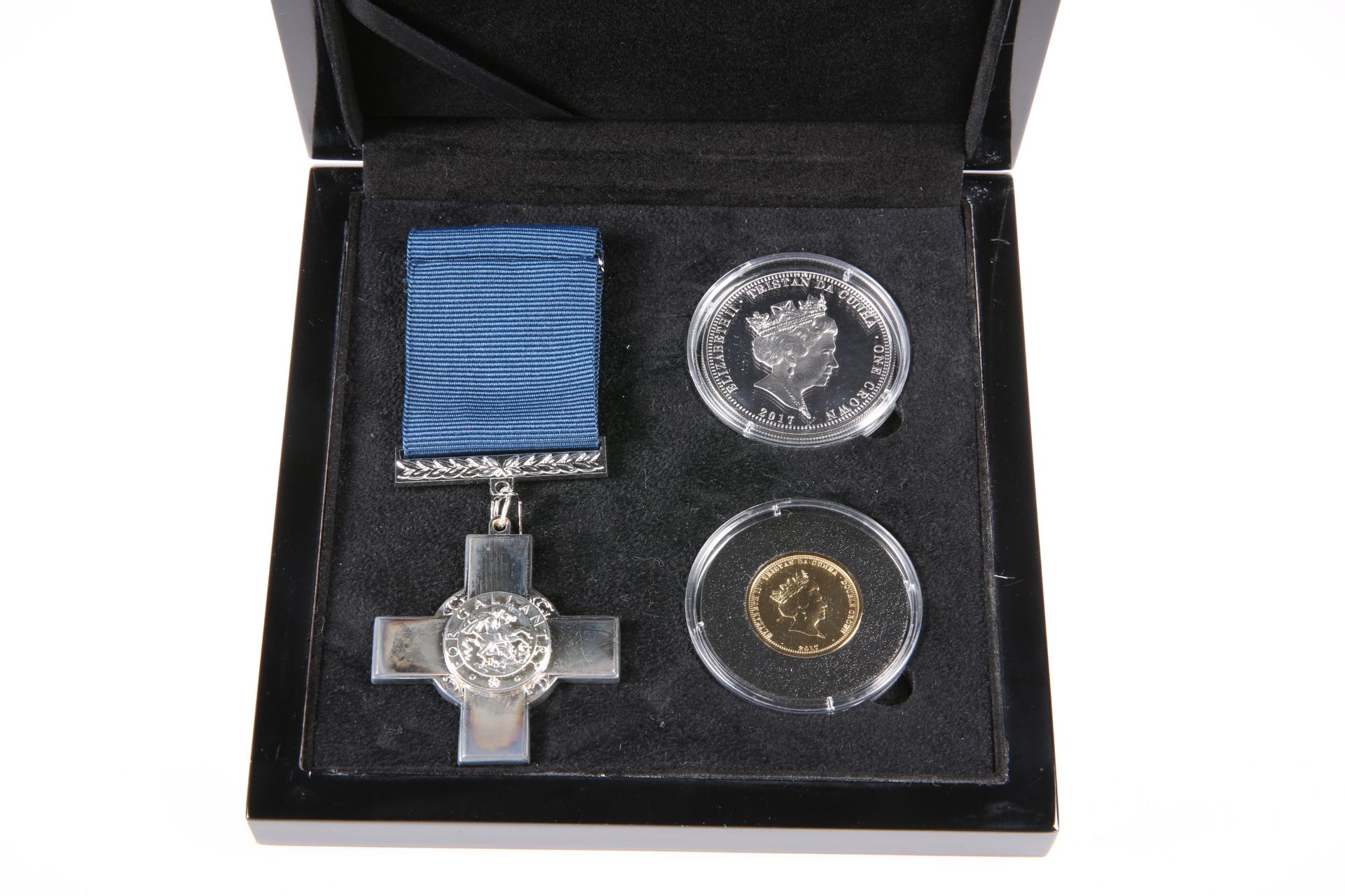 A GEORGE CROSS GOLD AND SILVER PROOF SET, comprising a sterling silver crown, a 9 carat white gold