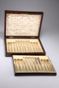 A SUITE OF EDWARDIAN SILVER FRUIT KNIVES AND FORKS, by George Howson, Sheffield 1908, comprising