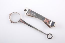 A LARGE EDWARDIAN SILVER DOUBLE-ENDED CIGAR CUTTER, by Goldsmiths & Silversmiths Co Ltd, London