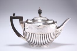 SPORTING INTEREST: AN EDWARDIAN SILVER TEAPOT, William Hutton & Sons Ltd, London 1909, oval,