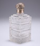 A VICTORIAN SILVER MOUNTED CUT GLASS SCENT BOTTLE, Birmingham 1896, square form, the lid embossed