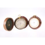 ~ A NEGRETTI & ZAMBRA 2 3/4-INCH BRASS BODIED TRAVELLING BAROMETER WITH THERMOMETER 'COMPENSATED',