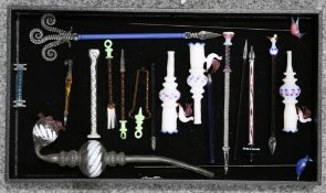 A COLLECTION OF VICTORIAN AND LATER GLASS NOVELTIES, including cheroot holders, pipe, dip pen with