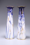 A PAIR OF DOULTON BURSLEM BLUE AND WHITE VASES, of tapering cylindrical form, each painted and