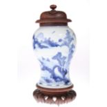 A CHINESE BLUE AND WHITE 'LANDSCAPE' VASE, 18TH CENTURY, of baluster form, painted with a