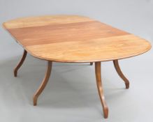 AN EARLY 19TH CENTURY MAHOGANY DINING TABLE, possibly Scottish, the D-ends with moulded top and