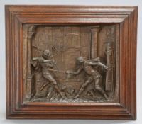 A FLEMISH SPELTER PANEL, 19TH CENTURY, cast in high relief with a sword fight, in an oak frame. 50cm