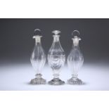 THREE ENGLISH GLASS CONDIMENT BOTTLES AND STOPPERS, CIRCA 1800