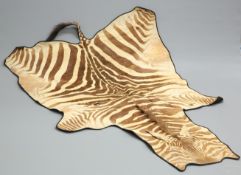 TAXIDERMY: BURCHELL'S ZEBRA FLAT SKIN RUG (EQUUS QUAGGA). 250cm by 173cm (excluding tail)The absence