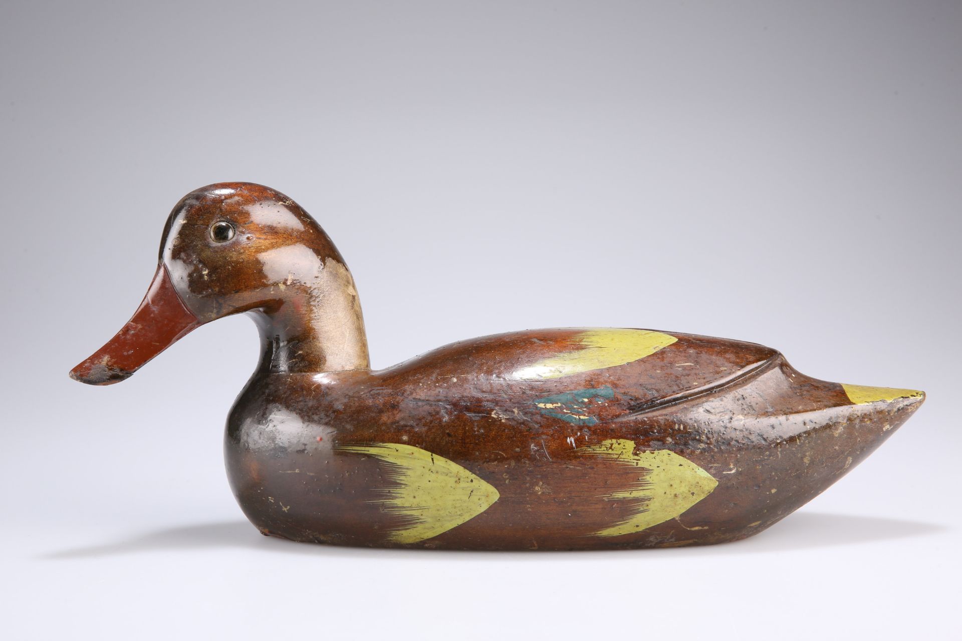 A VICTORIAN CARVED AND PAINTED DUCK DECOY with inset glass eyes. 35cm long - Bild 2 aus 2