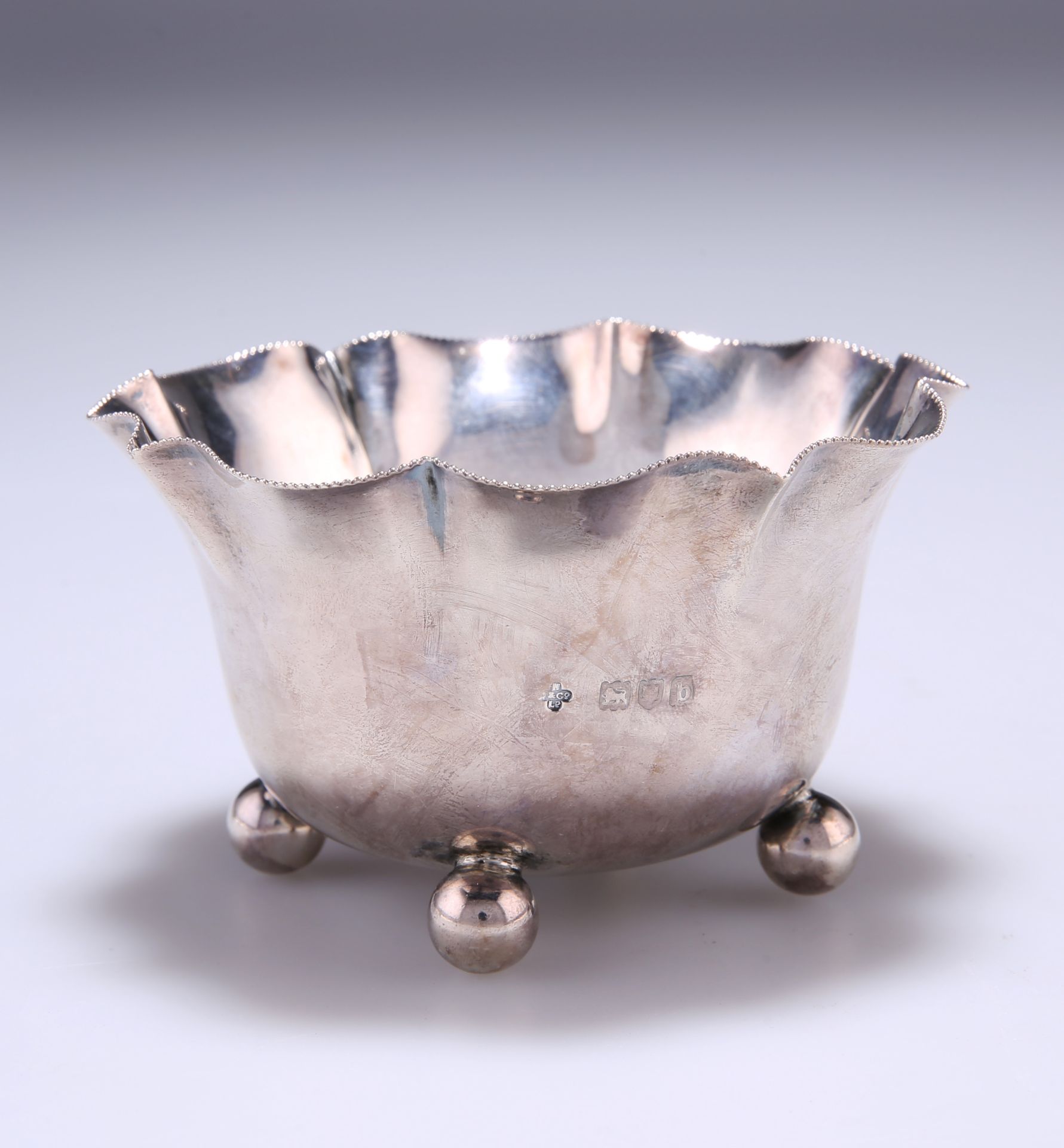 A VICTORIAN SILVER SUGAR BOWL, by Horace Woodward & Co Ltd, London 1897, with finely beaded wavy rim