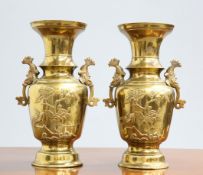 A PAIR OF JAPANESE BRONZE VASES C.1900, of baluster form, each with applied grotesque fish handles