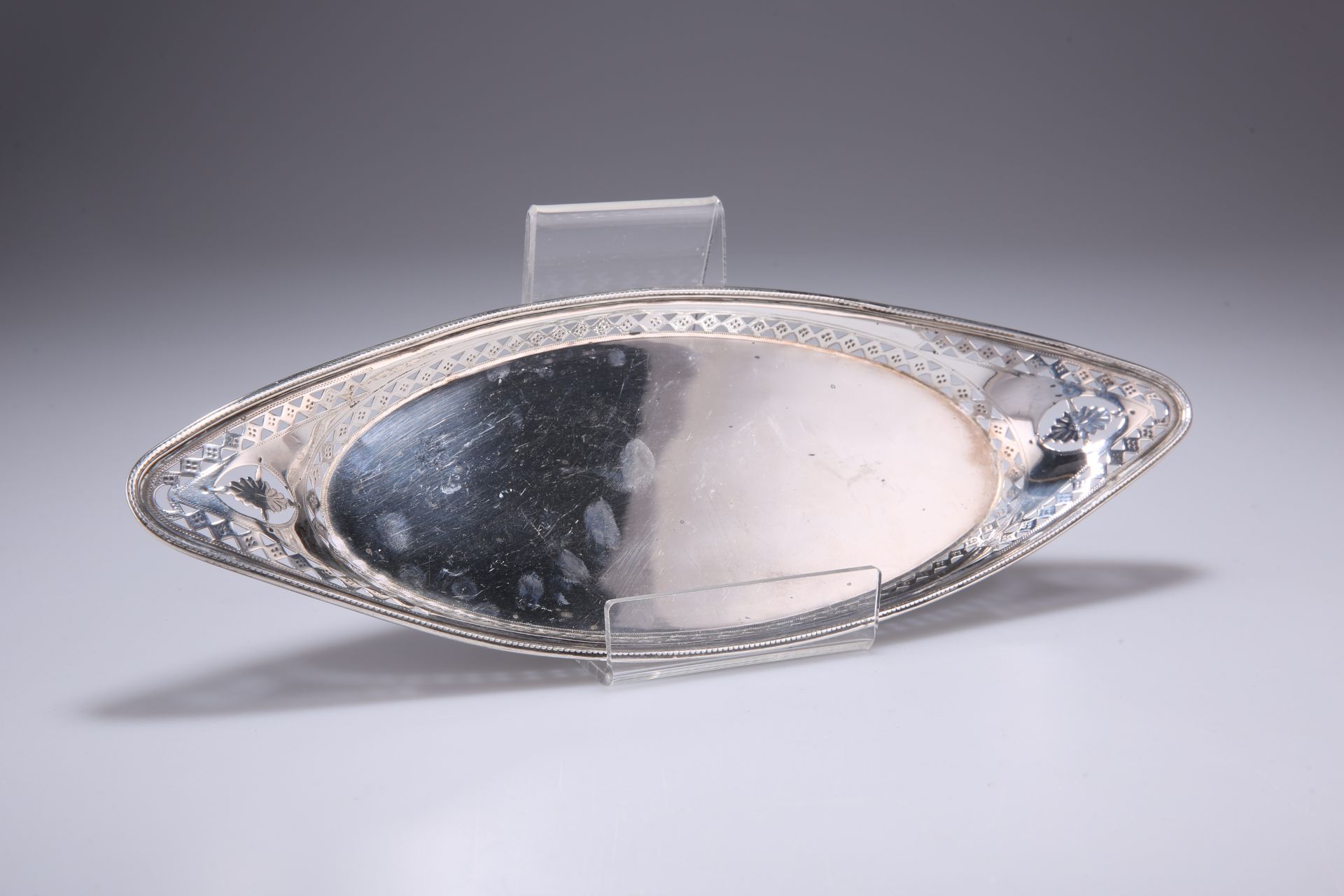 A VICTORIAN SILVER OVAL DISH, probably Charles Stuart Harris, London 1899, with pierced and bright-