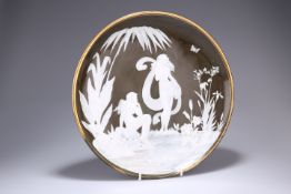 A GEORGE JONES PATE-SUR-PATE WALL PLAQUE, CIRCA 1880, probably by Frederick Schenck, circular, the
