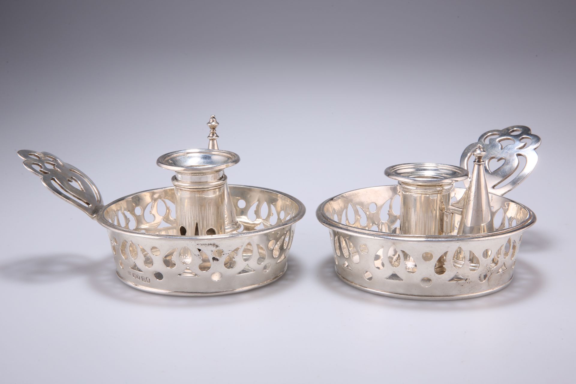 A MATCHED PAIR OF VICTORIAN SILVER CHAMBERSTICKS, by J Wrangham & William Moulson, London 1838/58,