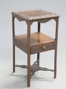 A GEORGE III OAK WASHSTAND, later carved, the now square top with blind-fretwork varved band and