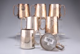 ^ A COLLECTION OF SEVEN SILVER-PLATED 1 PINT TANKARDS, including three with Royal Hussars engraved