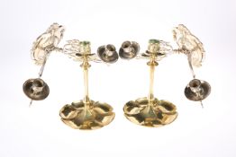 A PAIR OF LATE VICTORIAN BRASS CANDLESTICKS, each with lobed base; together with A PAIR OF ART