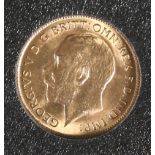 A 1914 HALF SOVEREIGN.