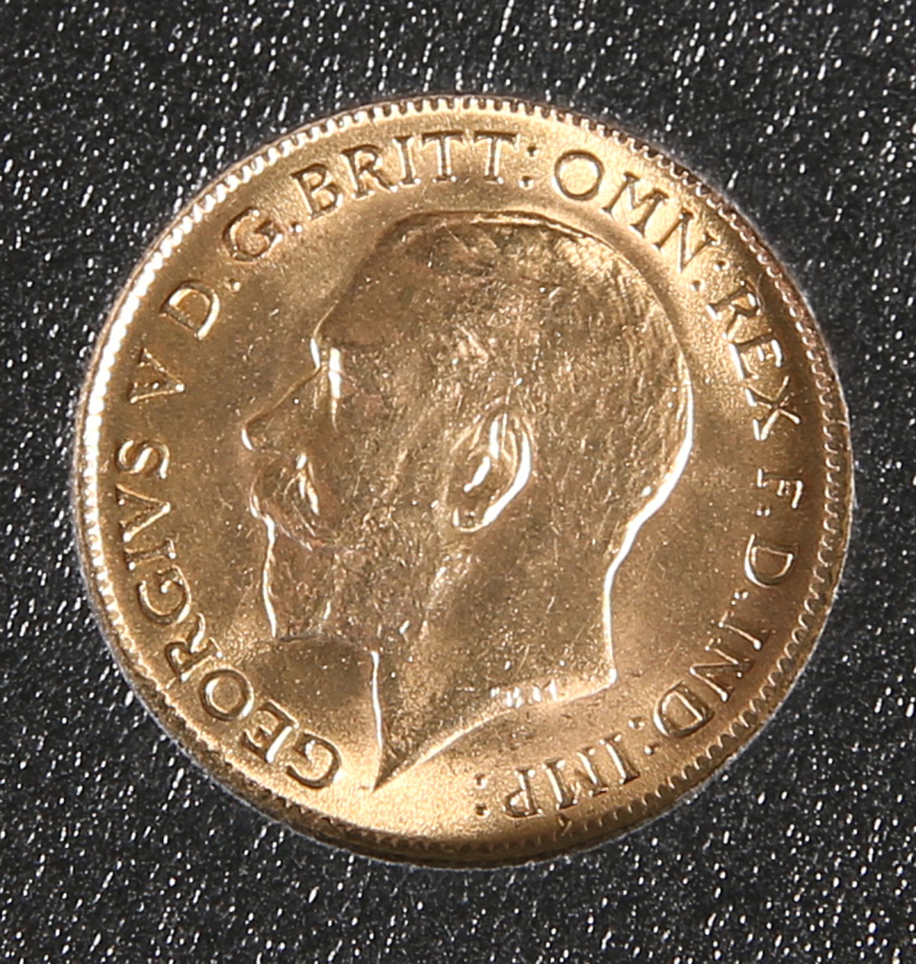 A 1914 HALF SOVEREIGN.