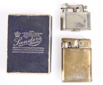 A RARE LADY'S CIGARETTE LIGHTER BY DUNHILL, the silver-plated body incorporating a shrouded guard