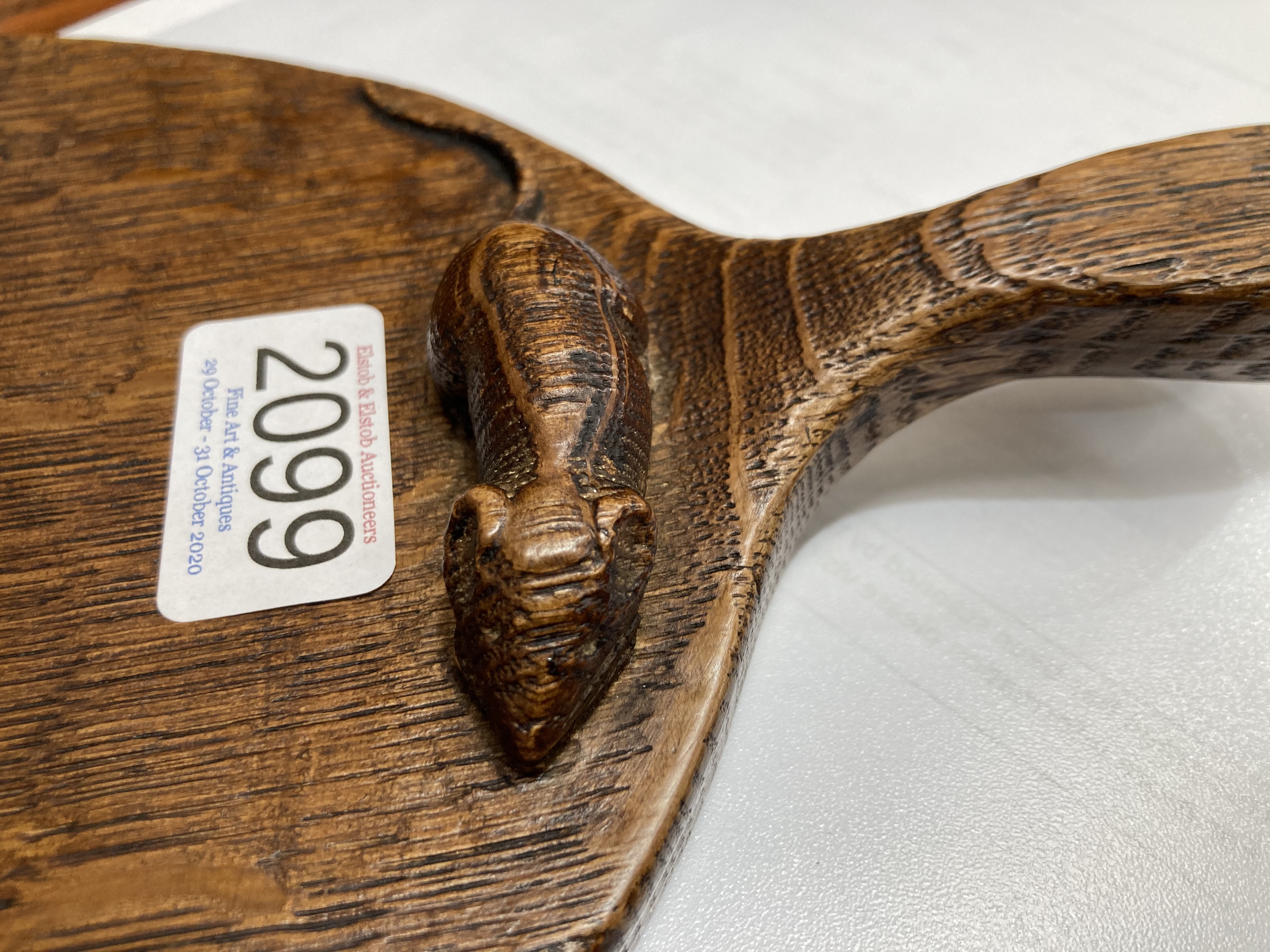 ROBERT THOMPSON OF KILBURN AN EARLY MOUSEMAN OAK CHEESEBOARD, carved mouse signature to the oval - Image 3 of 4