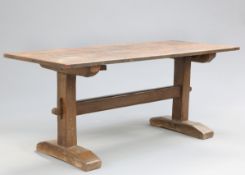 AN EARLY 19TH CENTURY COUNTRY OAK REFECTORY TABLE, with trestle base. 73cm high, 179cm long, 72.