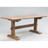 AN EARLY 19TH CENTURY COUNTRY OAK REFECTORY TABLE, with trestle base. 73cm high, 179cm long, 72.