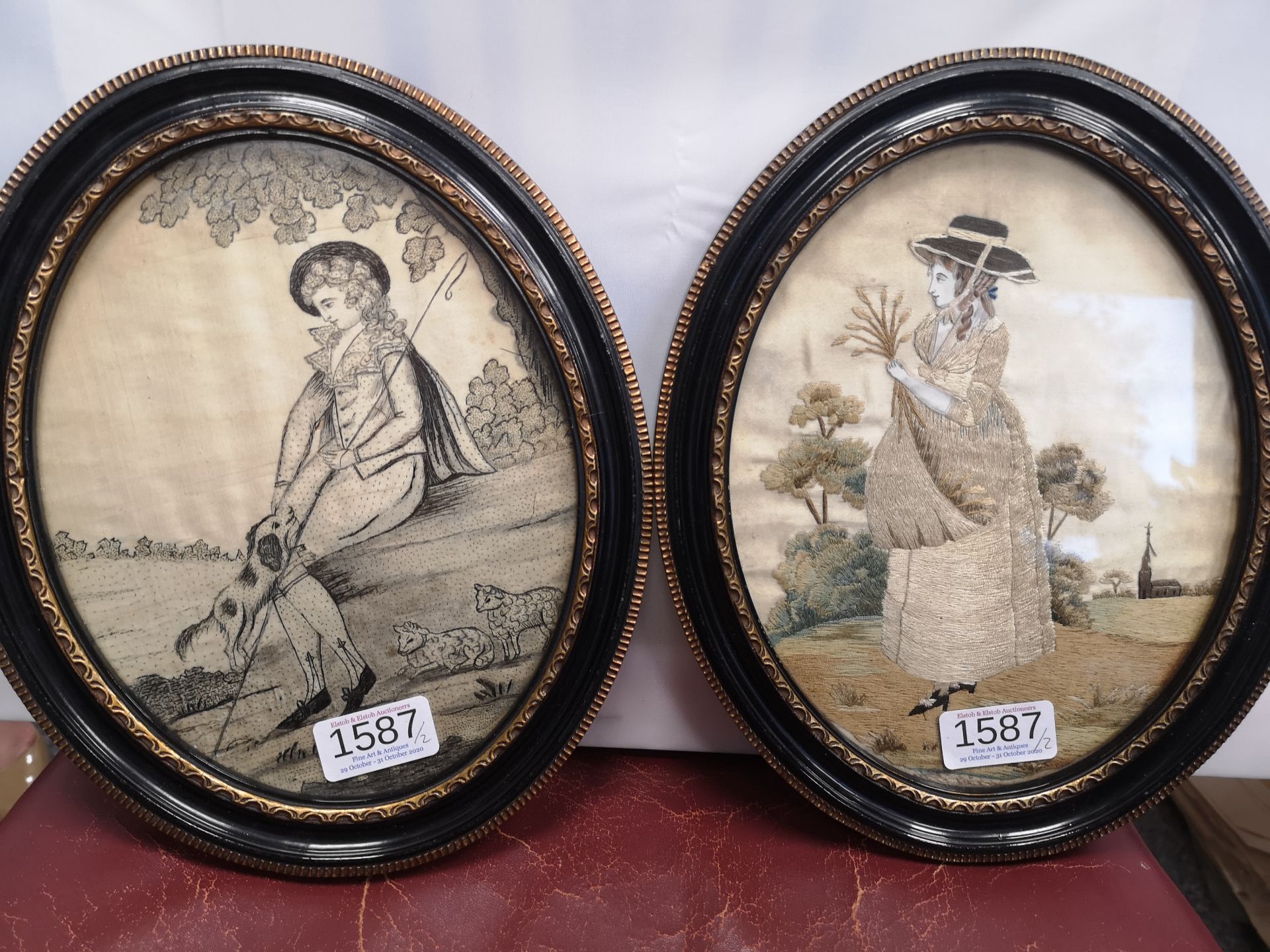 A PAIR OF EARLY 18TH CENTURY SILKWORK PICTURES, c. 1740, one depicting a shepherd boy with dog and