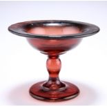 AN 18TH CENTURY GLASS TAZZA, APPARENTLY HULL GLASS, with baluster stem and plain circular foot,