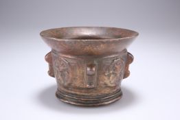 A BRONZE MORTAR, probably Spanish and 17th Century, with flared rim, the sides with lugs. 14cm