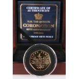 A 2018 GOLD PROOF FIFTY PENCE COIN, "H.M. THE QUEEN'S CORONATION 65TH ANNIVERSARY", no. 021, boxed