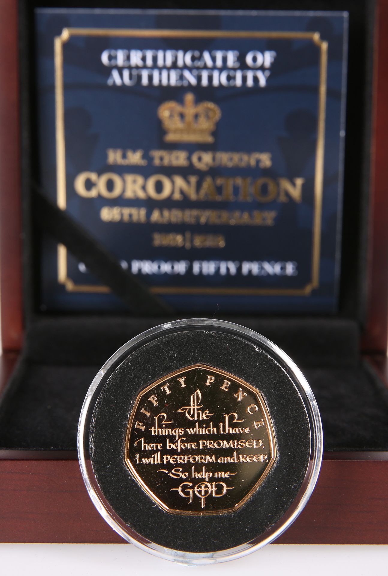 A 2018 GOLD PROOF FIFTY PENCE COIN, "H.M. THE QUEEN'S CORONATION 65TH ANNIVERSARY", no. 021, boxed