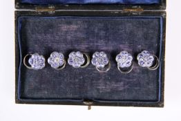 A SET OF SIX EDWARDIAN SILVER AND ENAMEL BUTTONS, by John Millward Banks, Chester 1907, each