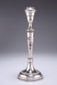 A CONTINENTAL SILVER METAL CANDLESTICK, with tapering stem and urn-shaped sconce above a circular